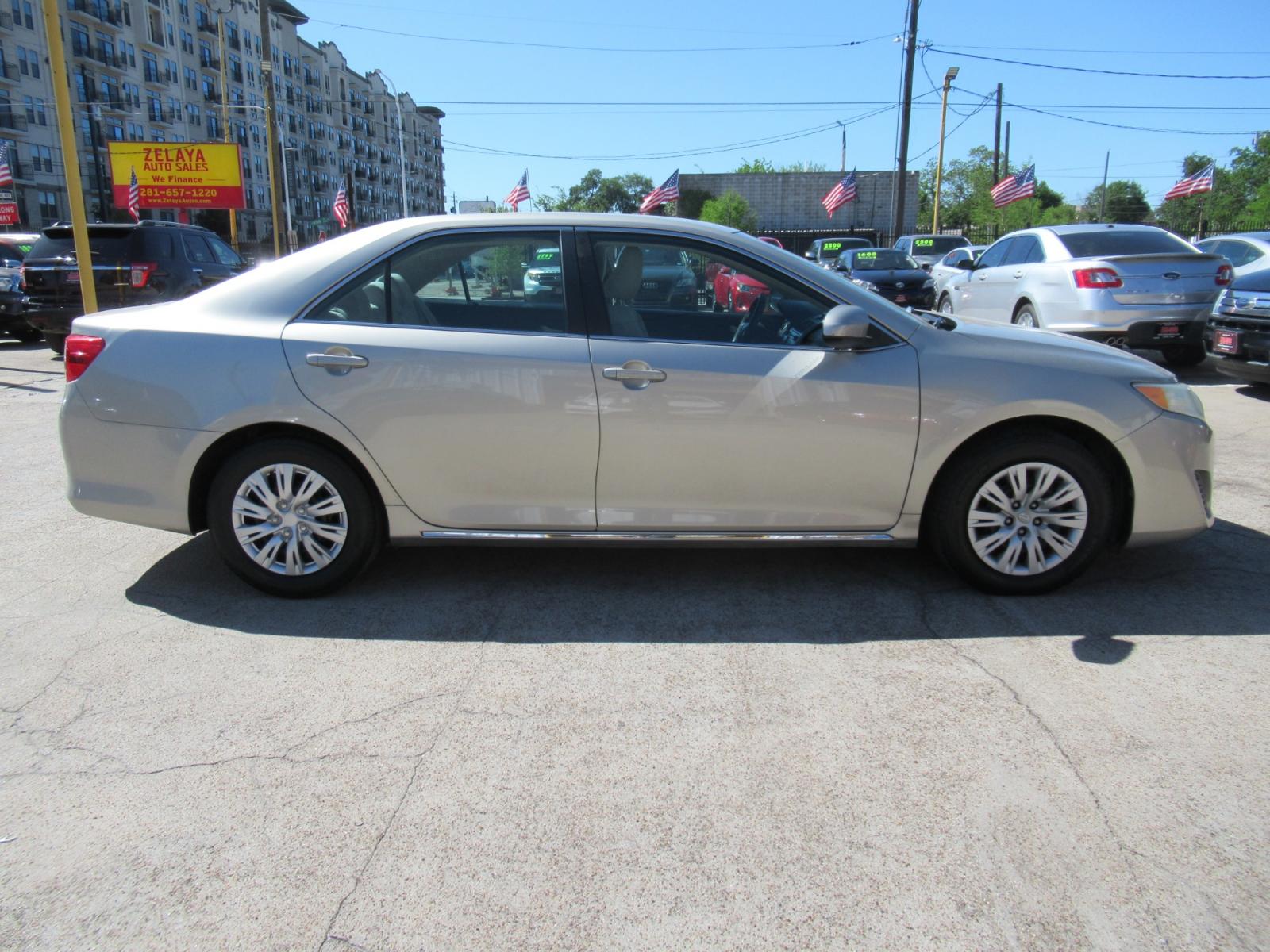 2014 /Tan Toyota Camry L (4T4BF1FK2ER) with an 2.5L L4 DOHC 16V engine, Automatic transmission, located at 1511 North Shepherd Dr., Houston, TX, 77008, (281) 657-1221, 29.798361, -95.412560 - 2014 TOYOTA CAMRY LE VIN: 4T4BF1FK2ER364962 4 T 4 B F 1 F K 2 E R 3 6 4 9 6 2 SEDAN 4 DR 2.5L I4 F DOHC 16V GASOLINE FRONT WHEEL DRIVE - Photo #18